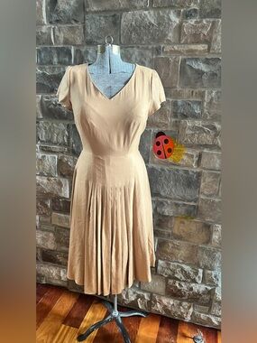 Coldwater Creek Classic V-Neck Pleated Midi Dress in tan.